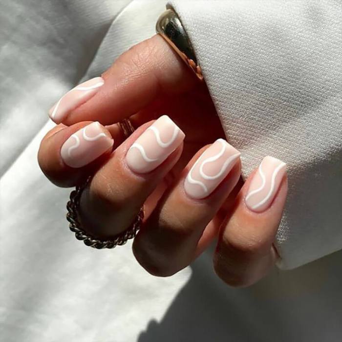 White nail polish with design